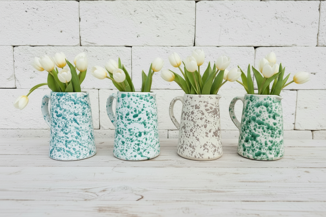 Tulipani in tutte e quattro le brocche