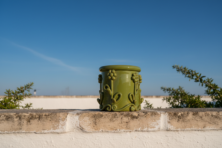 Vaso verde su muretto